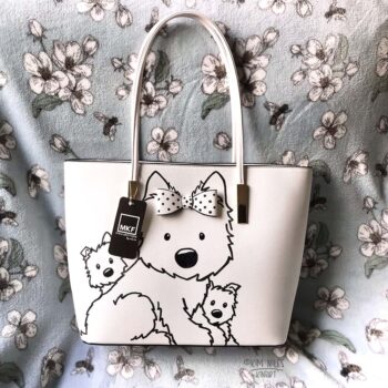 OOAK Hand painted Westies on a black and white Tote size purse featuring a 3D bow on front of bag to look like it’s at worn by the mother-Westie with two Westie puppies painted on either side of her